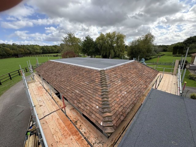 New tiled and flat roof