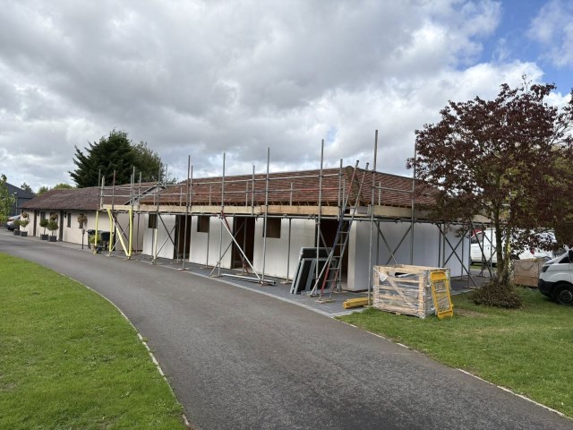 New tiled and flat roof